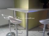 Table en verre et pied inox